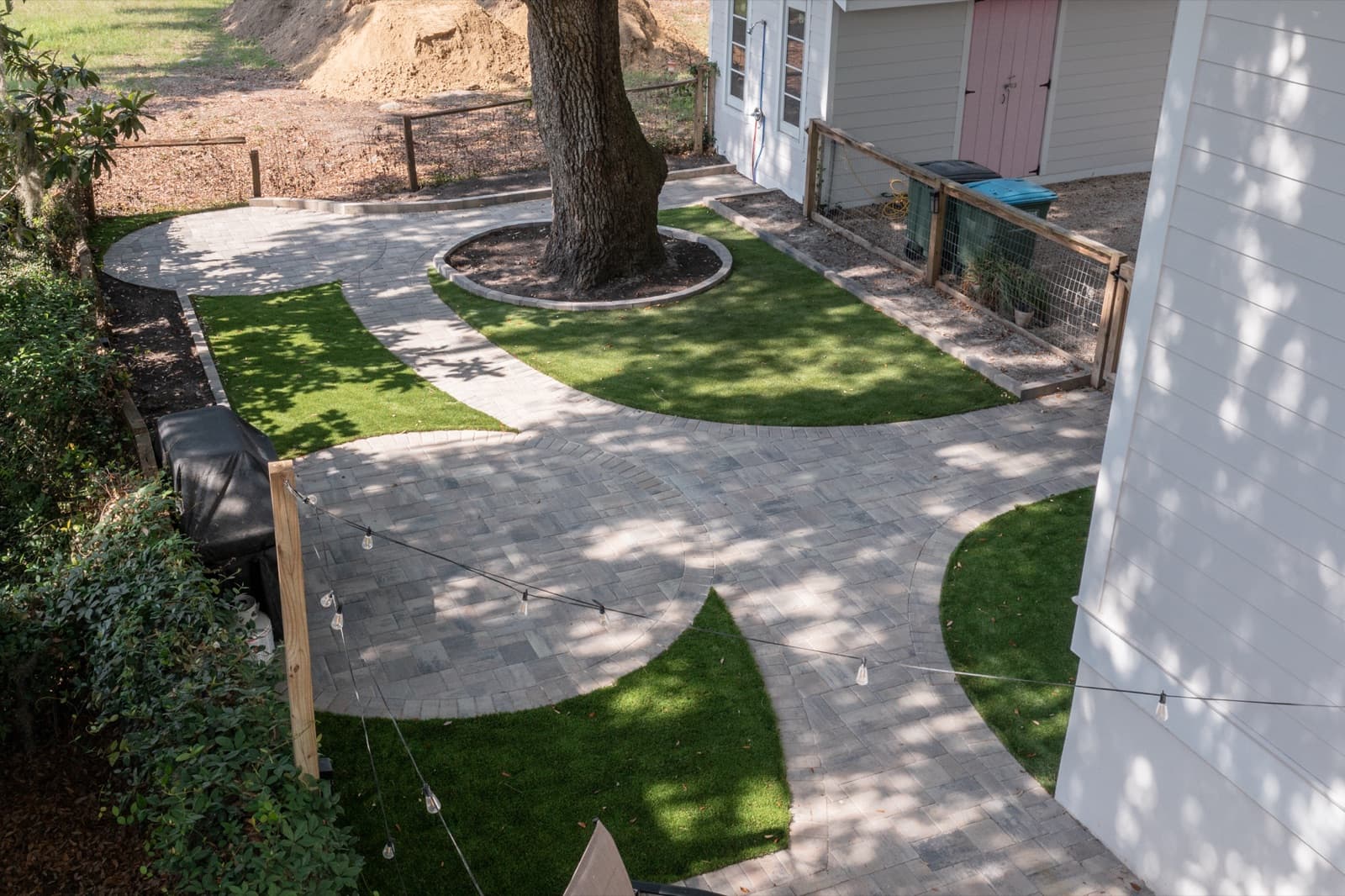 Paver and turf detail showing crisp borders between the two materials