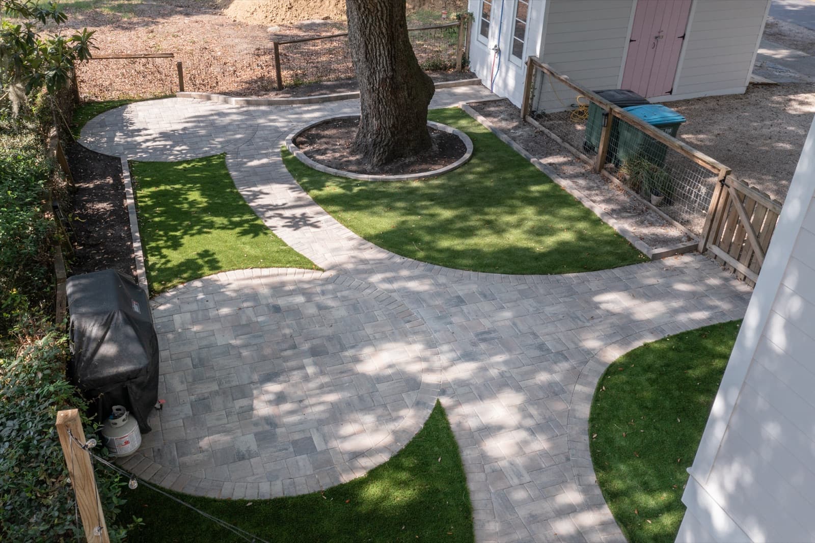 The finished low-maintenance backyard under the oaks in Beaufort, SC