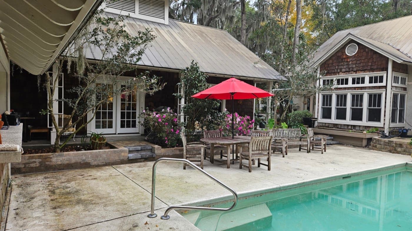 Herringbone-pattern paver patio installed by Carolina Paver & Turf in the Lowcountry