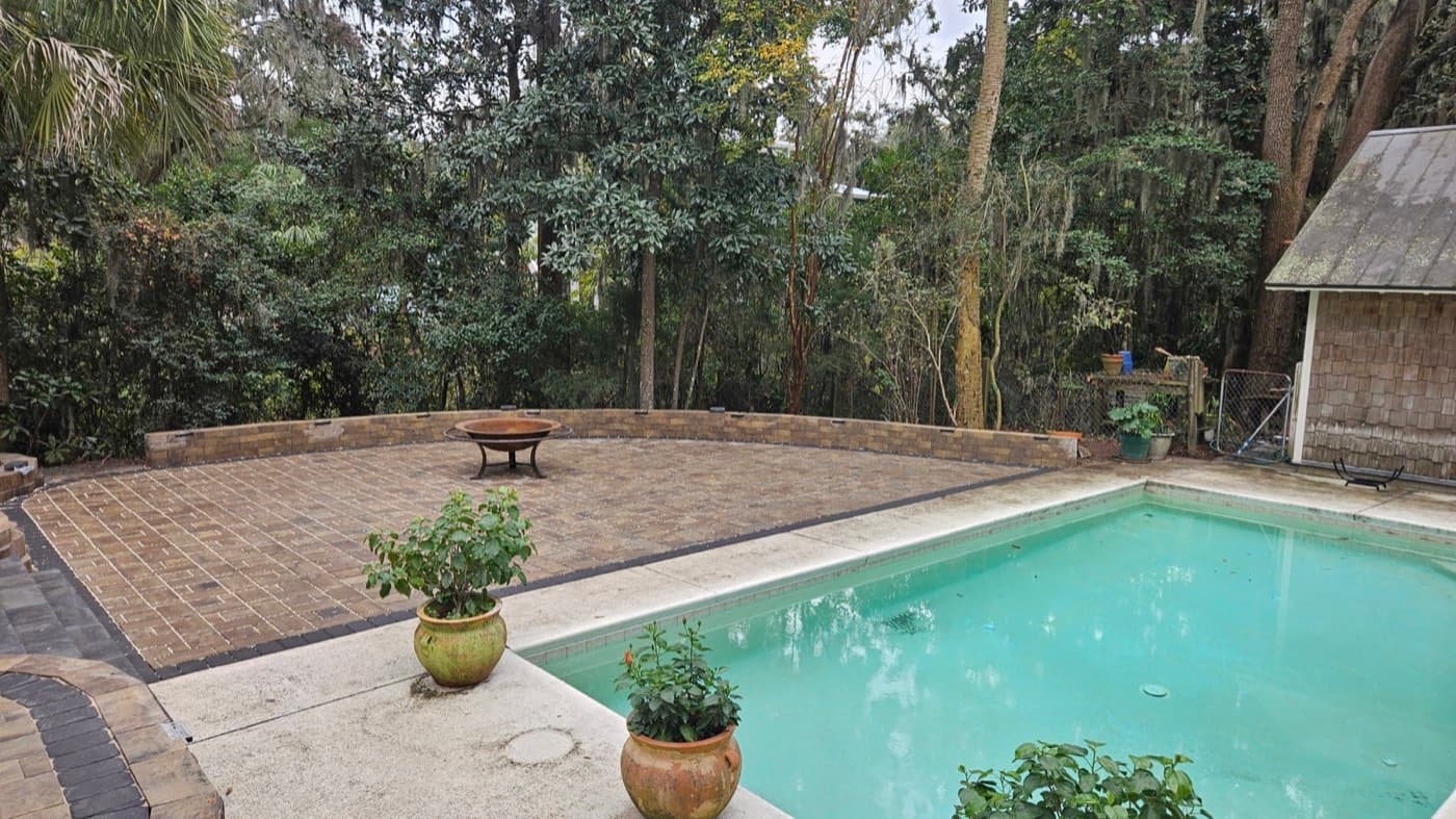 Basketweave brick-look paver patio with a traditional woven pattern