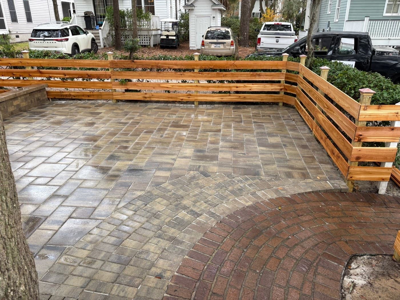 Compact courtyard paver patio in a small urban backyard